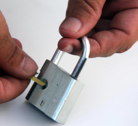 A person trying to open a lock without use of its keys-what is lock picking