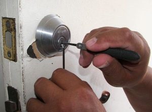 lock picking practice on door lock with lock picking tools