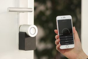 smart lock being opened with the help of a phone